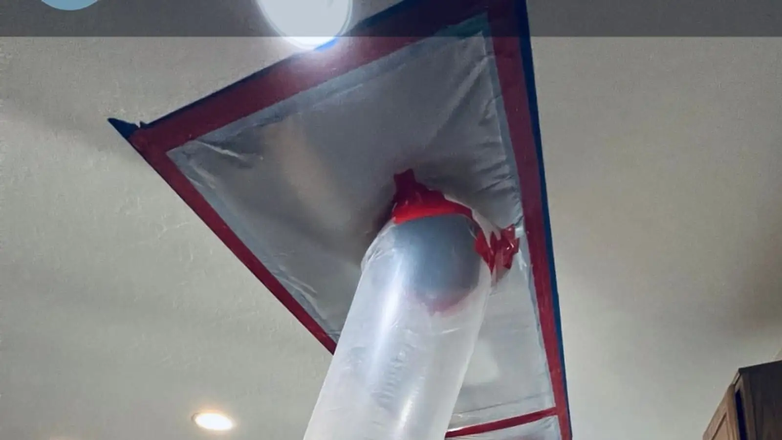 Drying ducts set up to dry a water-damaged ceiling — Fast Track Restoration