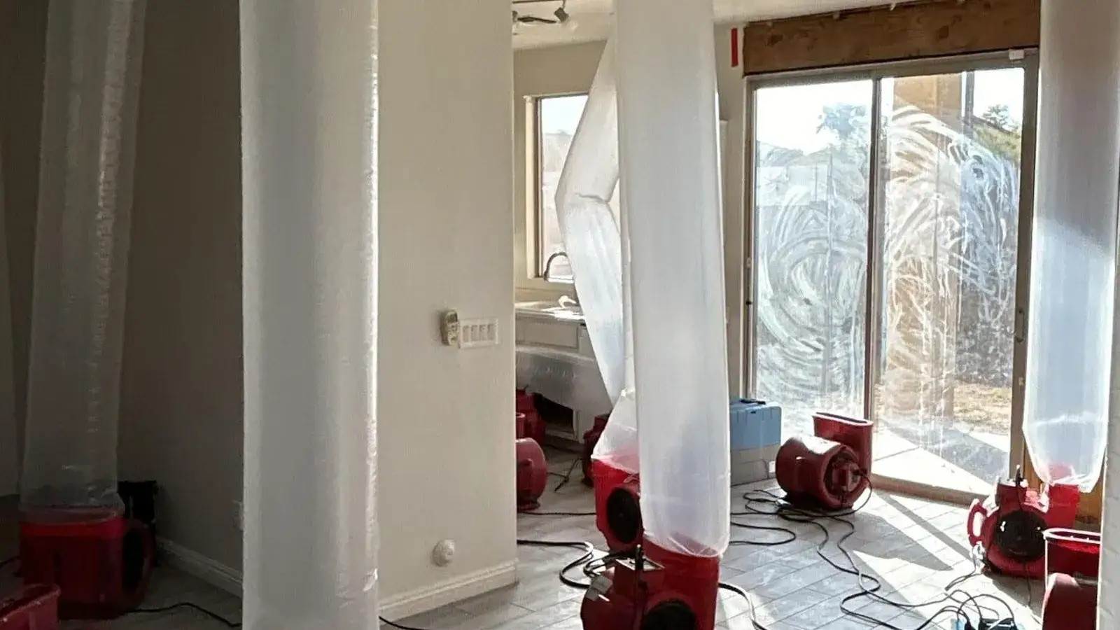 Structural drying equipment running inside a containment — Fast Track Restoration