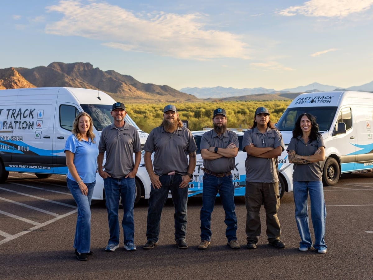 The Fast Track Restoration team and vans